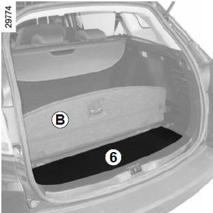 Renault Megane. Ablagefächer unter der Bodenmatte